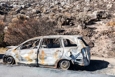 Fire-damaged car shell after a vehicle fire